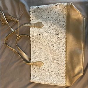 Super cute gold and white bag